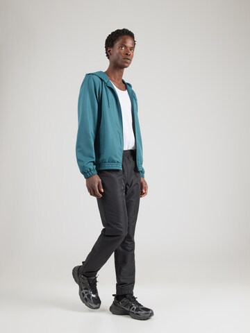 Costum de trening 'Carson 024' de la Sergio Tacchini pe verde