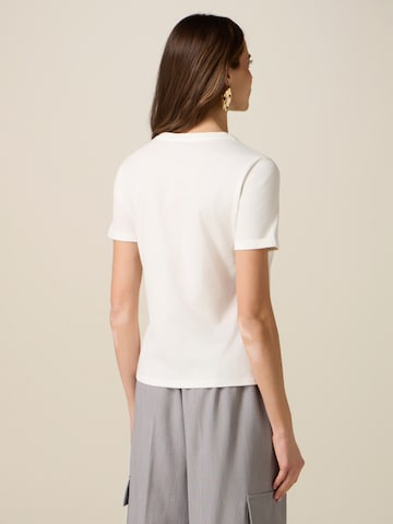 T-shirt oltre en blanc