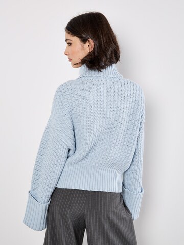 Pull-over ' ' Apricot en bleu