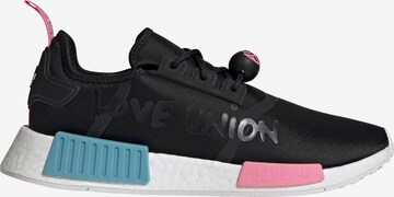 ADIDAS ORIGINALS Sneaker low 'NMD_R1 x André Saraiva' in Schwarz