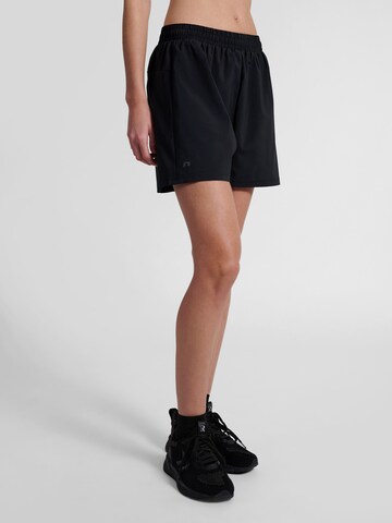 Newline Loose fit Sports trousers 'Max' in Black: front