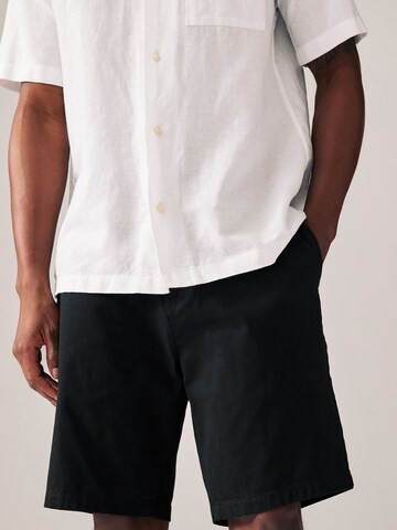 Next - Slimfit Pantalón chino en azul
