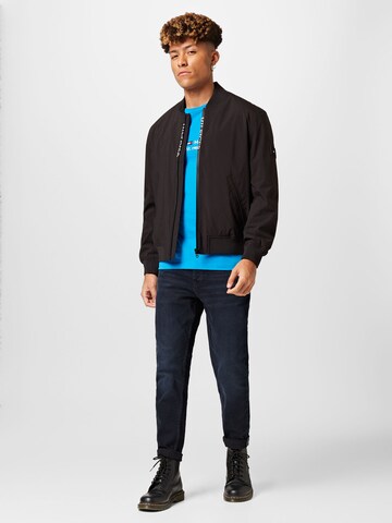 TOMMY HILFIGER Between-Season Jacket in Black