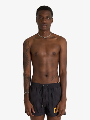 Pantaloncini da bagno di DSQUARED2 in giallo: frontale
