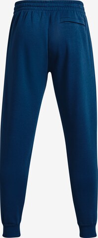 UNDER ARMOUR Tapered Sportbroek in Blauw