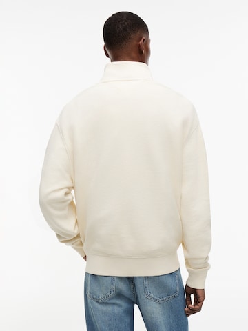 Tommy Jeans Collegepaita värissä beige