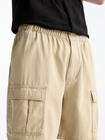 Pull&Bear Ohlapna forma Kargo hlače | rjava barva