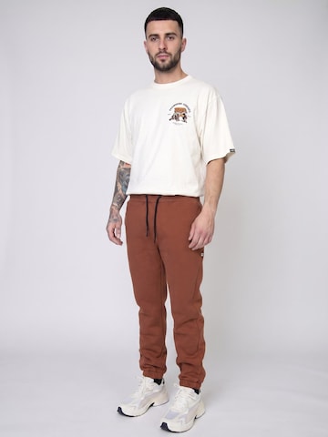 KANGOL Baggy Hose 'Essential Mahogany'‌‌‌‌‌‌‌‌ in Braun