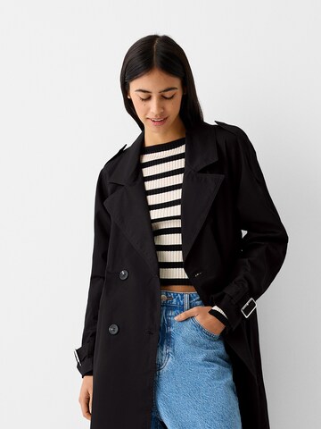 Bershka Between-seasons coat in Black: front