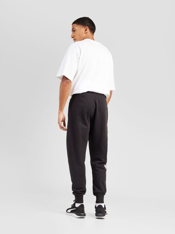 PUMA Tapered Workout Pants 'Posterize 2.0' in Black