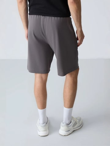 Wide leg Pantaloni di Tommy Life in grigio