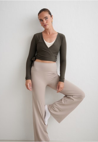 Aim'n - Blusa funcionais em verde