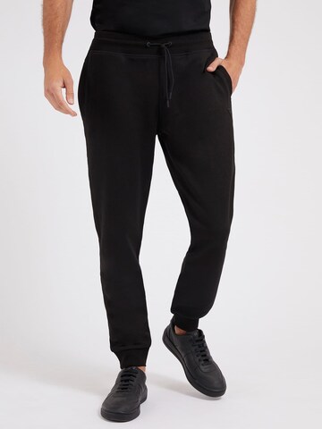 GUESS Tapered Pants in Black: front