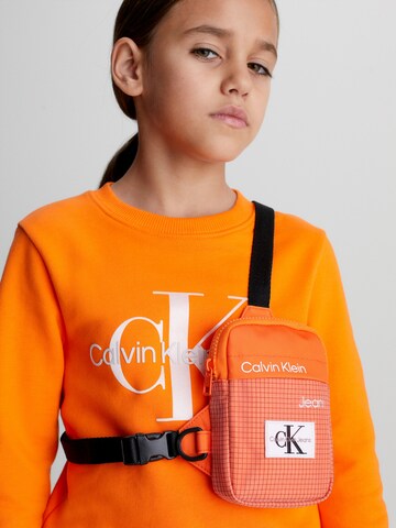 Calvin Klein Jeans Umhängetasche in Orange