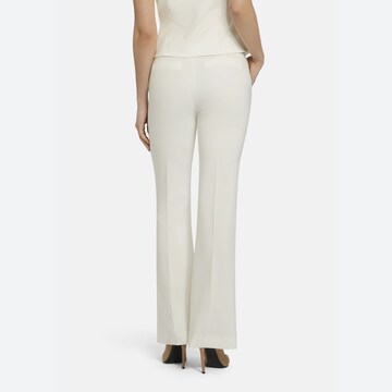 Coupe slim Pantalon à plis Nicowa en blanc