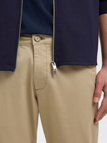 Slimfit Pantaloni '16087663' di SELECTED in beige