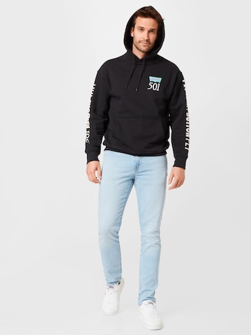 LEVI'S ® Tavaline suurus Dressipluus 'Relaxed Graphic Hoodie', värv must