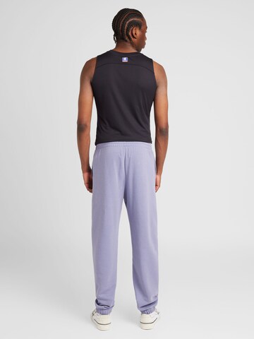 Tapered Pantaloni di Champion Authentic Athletic Apparel in lilla