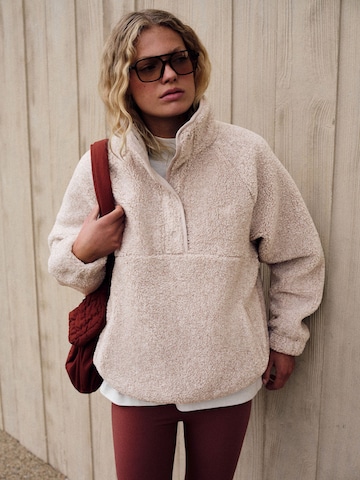 Pull-over self. en beige : devant