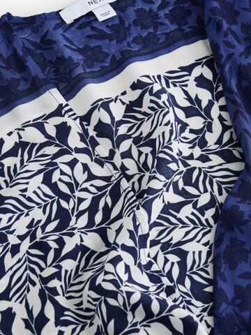 Next - Capa en azul