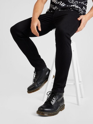 Versace Jeans Couture Slim fit Chino trousers in Black: front