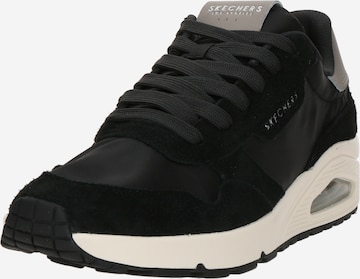 SKECHERS Matalavartiset tennarit 'UNO' värissä musta: etupuoli
