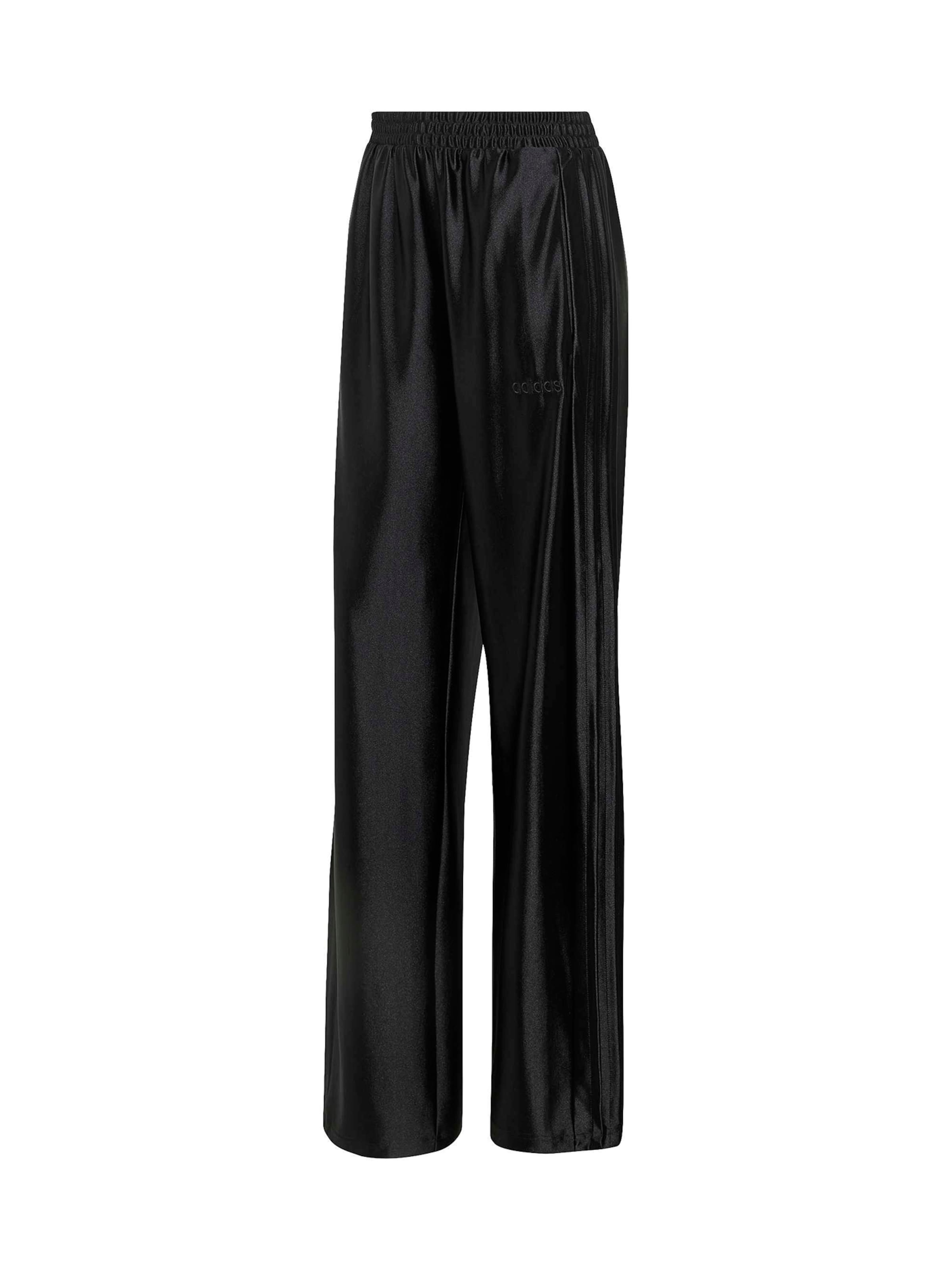 Loosefit Pantaloni sportivi di ADIDAS SPORTSWEAR in nero: frontale