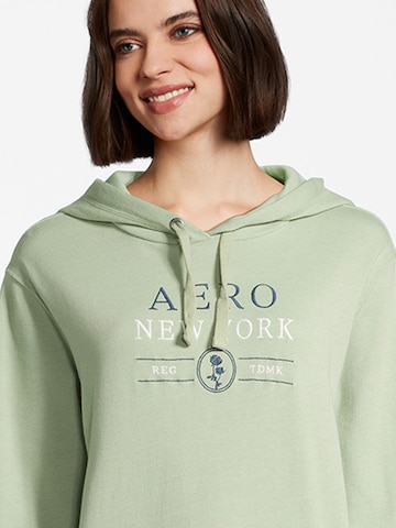 AÉROPOSTALE Sweatshirt 'MOVED ON' in Green