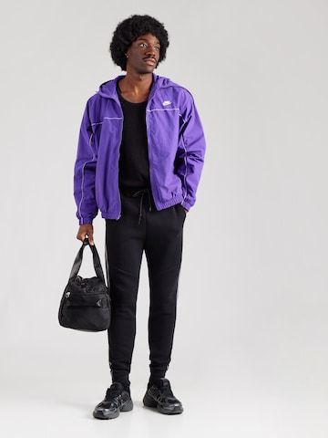 Effilé Pantalon 'TECH FLC' Nike Sportswear en noir