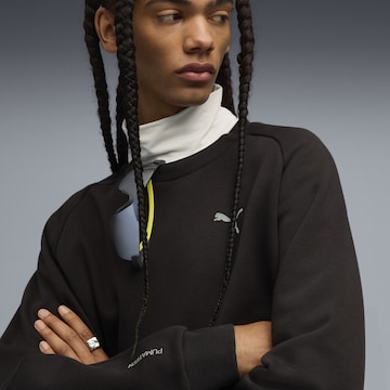 PUMA Sports sweatshirt in Black