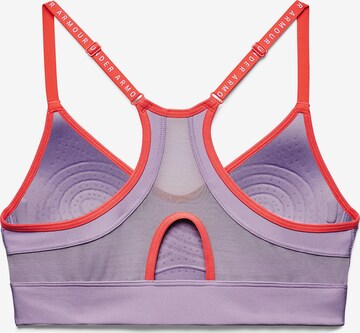 Low support Reggiseno sportivo 'Infinity' di UNDER ARMOUR in lilla