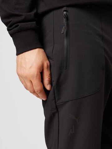 Regular Pantalon de sport PUMA en noir