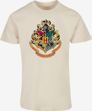 Maglietta 'Harry Potter - Hogwarts Crest Gold' di ABSOLUTE CULT in beige: frontale