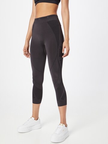 PUMA Skinny Workout Pants in Black: front