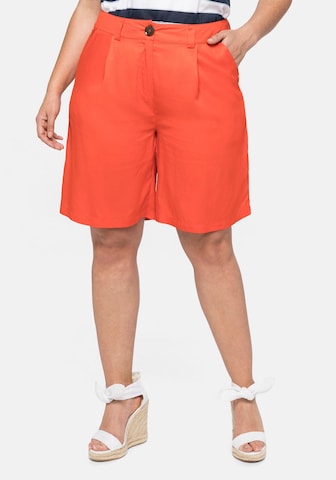 Loosefit Pantalon à pince SHEEGO en orange : devant