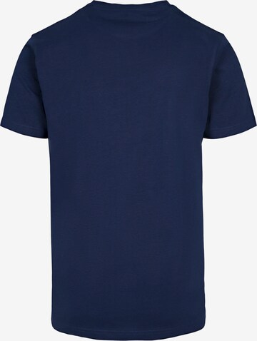 T-Shirt 'Never On Time' Merchcode en bleu