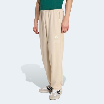 ADIDAS SPORTSWEAR Baggy Workout Pants in Beige: front