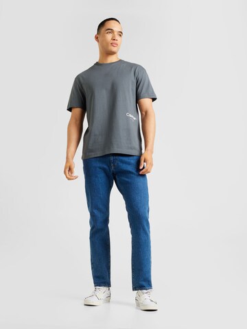 pelēks Calvin Klein T-Krekls 'OFF PLACEMENT'