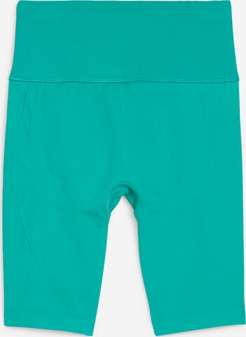 Skinny Pantalon de sport 'SHAPELUXE' PUMA en vert