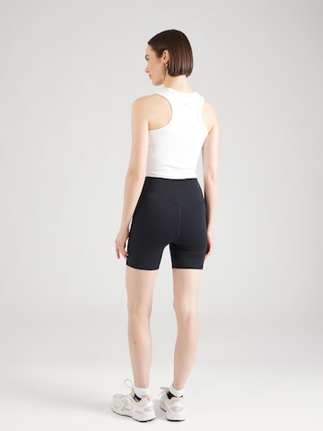 new balance Skinny Fit Спортен панталон 'Essentials Harmony' в черно