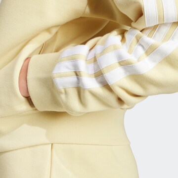 ADIDAS SPORTSWEAR Sports sweat jacket 'Essentials' in Yellow
