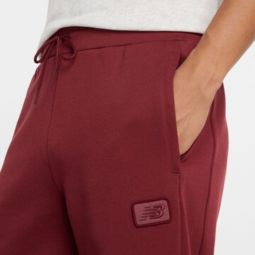 new balance - regular Pantalón deportivo 'Post Season' en rojo