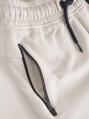 Next Tapered Hose in Grau