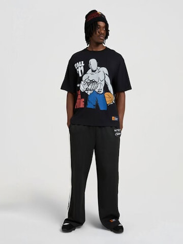 AND1 T-Shirt 'On Fire' in Schwarz