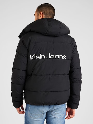 Calvin Klein Jeans Преходно яке 'Essential' в черно
