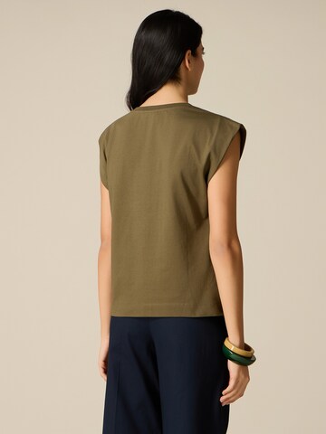 Haut oltre en vert