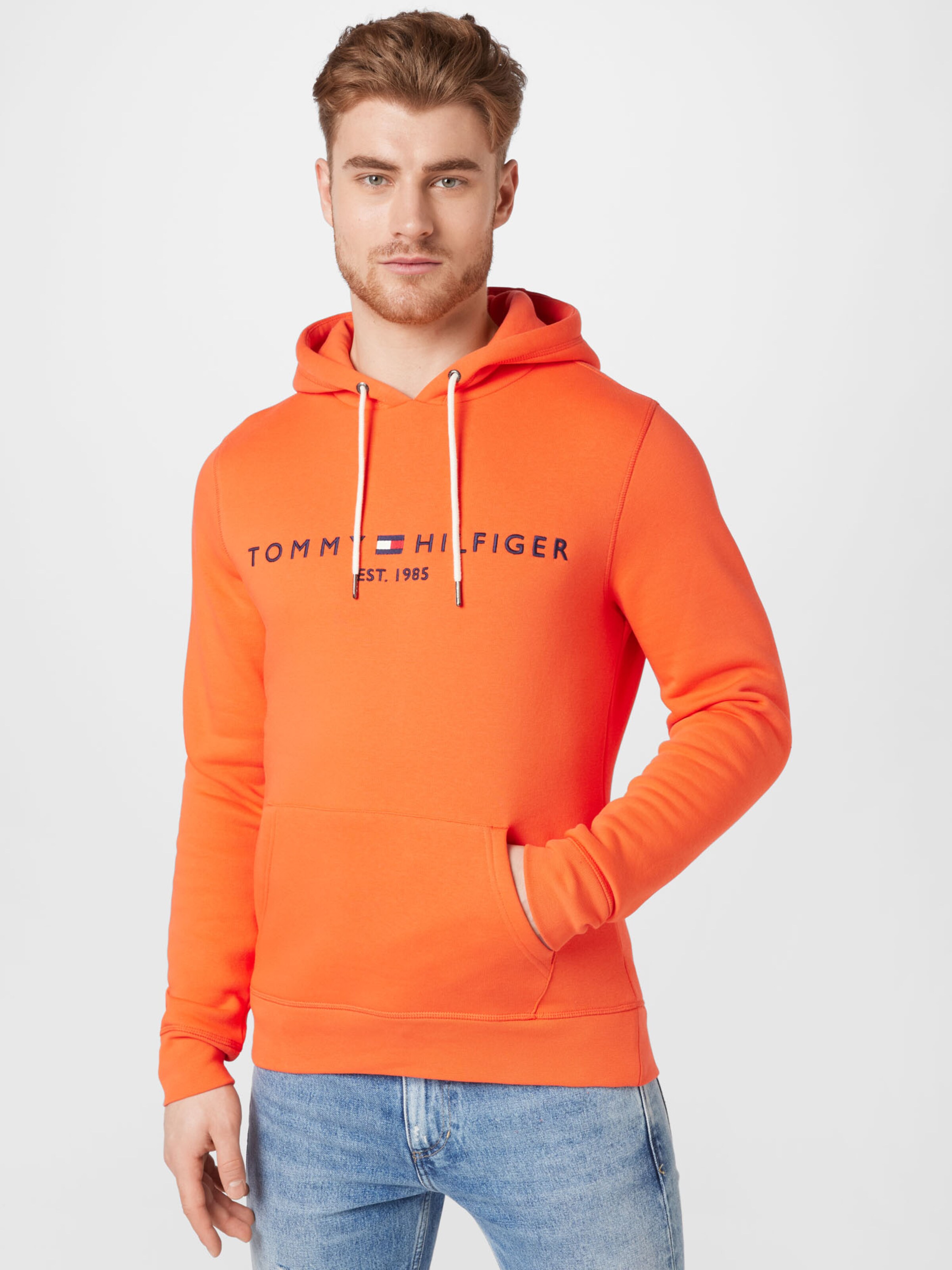 Neoninė Oranžinė TOMMY HILFIGER Megztinis be užsegimo | ABOUT YOU