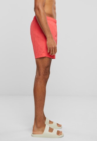 regular Pantaloni di Karl Kani in rosso
