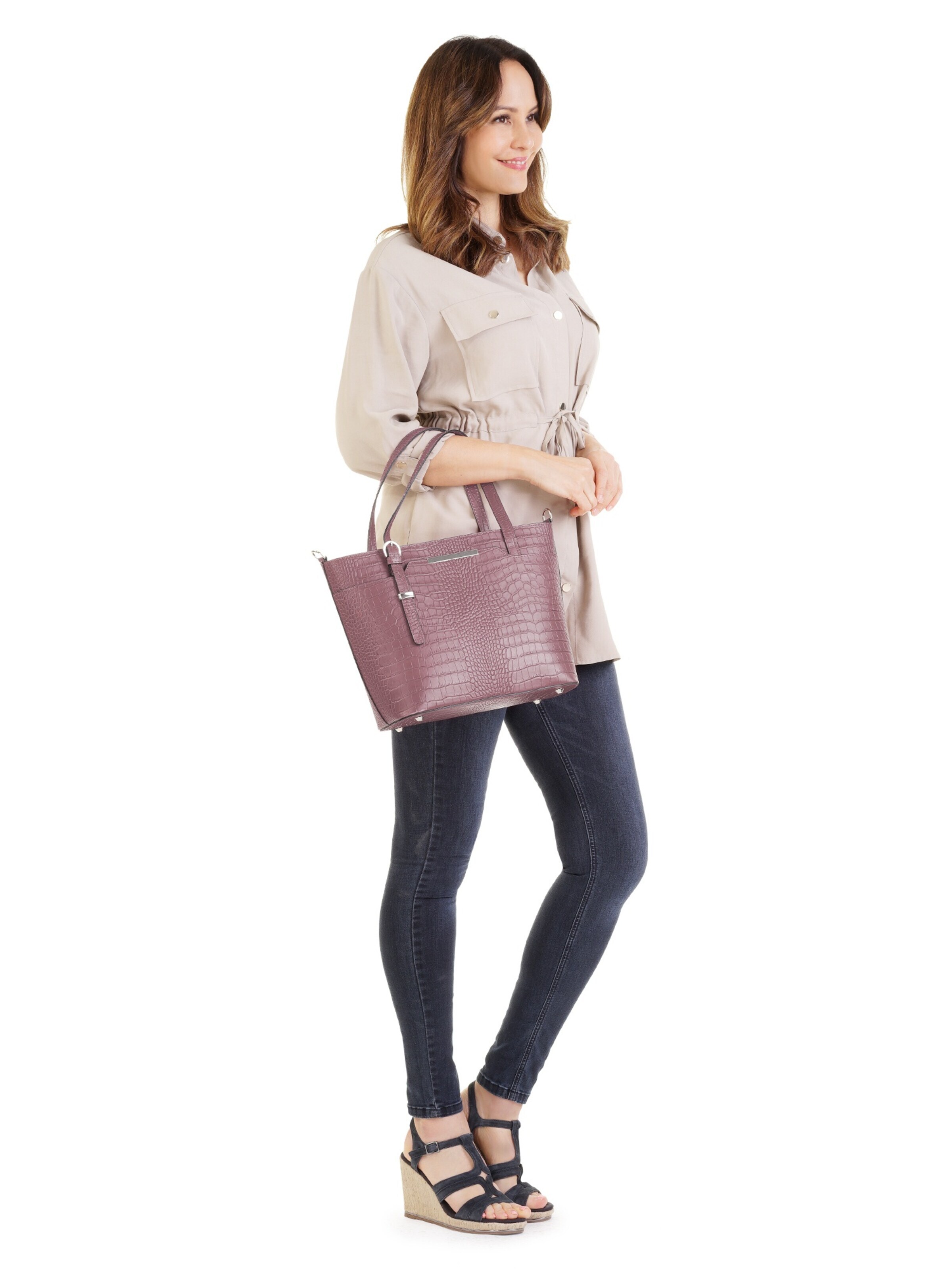 Cluty Handbag in Pink: front