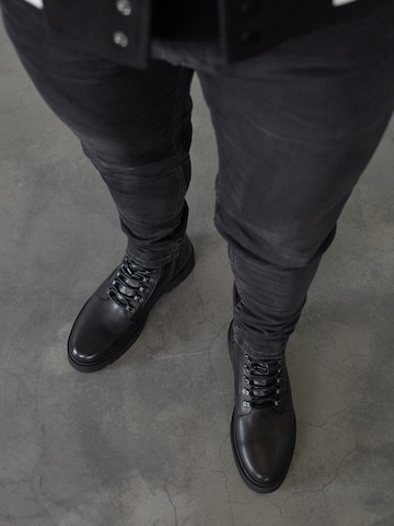 DAN FOX APPAREL Lace-Up Boots 'Alen' in Black